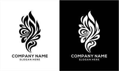 Obraz premium Elegant Black and White Abstract Floral Swirl Logo Design.