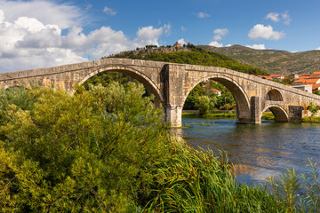 Fototapeta premium Arslanagica Most stone bridge crossing Trebisnjica river in Trebinje, Bosnia and Herzegovina.