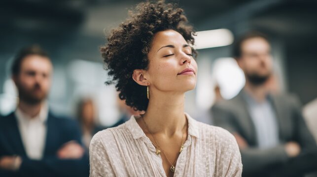 Woman relaxing in a busy office environment, embracing mindfulness and calm amidst work stress,Gender Equality Month