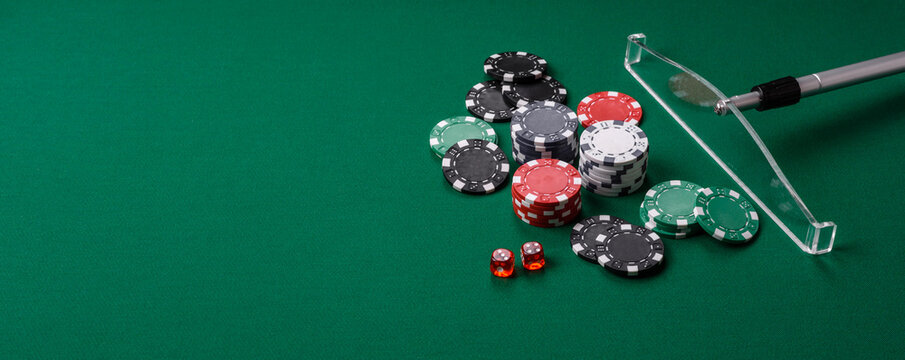 Casino dice and chips on a colored background, poker, gambling with bets. Dice and chips