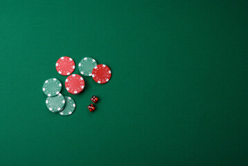 Casino dice and chips on a colored background, poker, gambling with bets. Dice and chips