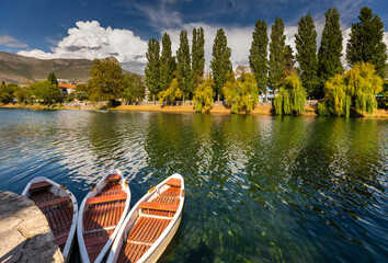 Traditional Wooden Rowboats Moored Along