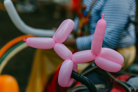 pink balloon animal at children&rsquo;s event close up