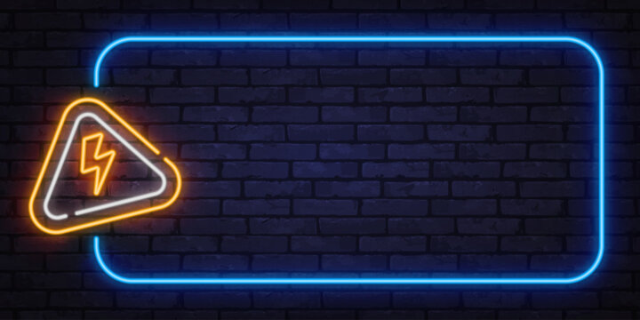 Neon warning frame with lightning symbol on dark brick wall. Bright electric glow creates a strong alert mood for safety or risk themes.