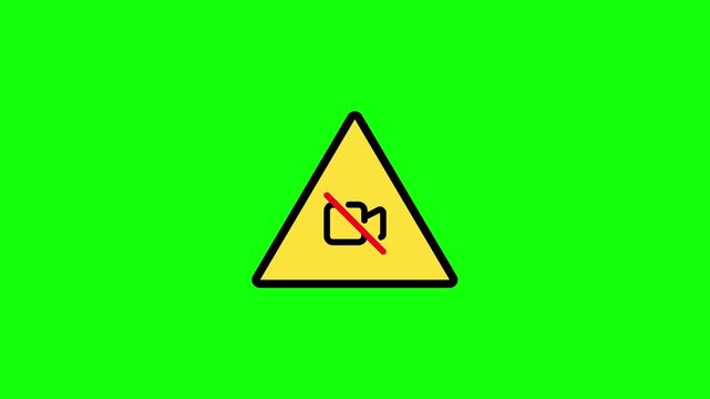 No Video Recording: A clear and concise warning symbol, a yellow triangle with a camera crossed out, indicating the prohibition of video recording, set against a vibrant green background.