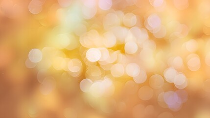 Obraz premium Soft bokeh light against a background of orange and yellow. The out-of-focus background creates a dreamy effect with the different warm tones.