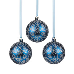 Three blue Christmas ornaments with silver glitter patterns