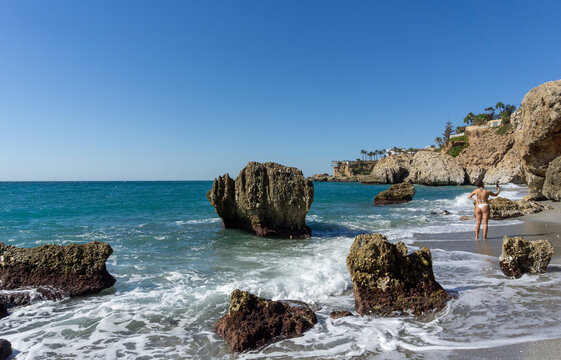 Beautiful Rocky Coastline and Turquoise Mediterranean Sea at Carabeo Beach in Nerja Costa del Sol Spain