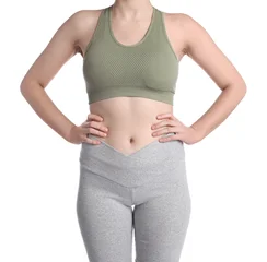 Fotobehang Onderzeeër Woman in sportswear after weight loss on white background, closeup  © New Africa