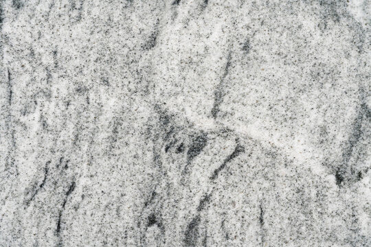 White granite with black and gray veins of Indian origin "Viscount White". Material for interior decoration. Natural stone.