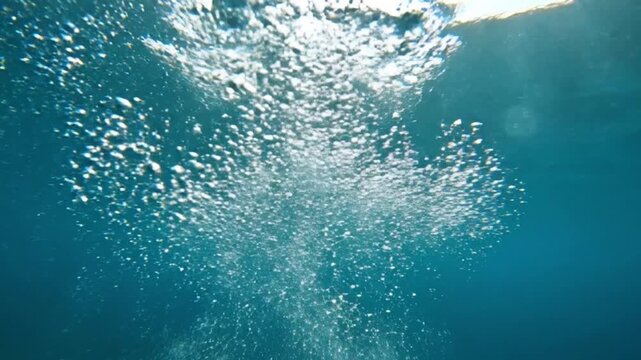 Underwater Bubbles Rising to Surface, Ocean Water, Clear Blue