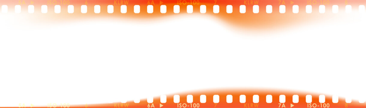 Panoramic 35mm film frame with warm orange light leaks. Vintage film strip border with sprocket holes and analog camera burn effect. Retro photographic scan overlay isolated on grey background.