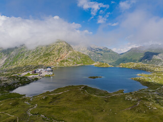 Scenic view of Totensee lake located near Grimsel Pass, surrounded by high alpine terrain and rugged mountain scenery in the Swiss Alps of Switzerland