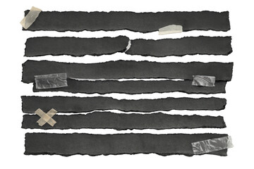 Fototapeta premium Black torn paper pieces taped across a transparent background, creating copy space for various design elements