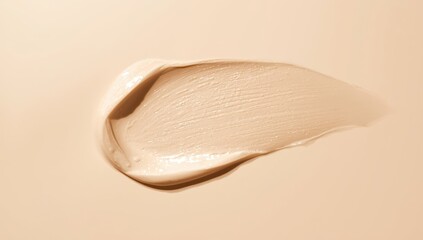 Fototapeta premium creamy cosmetic stain on a beige backdrop