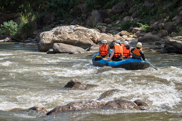 Tourists paddle whitewater river in Mae Taeng district of Chiang Mai. Chiang Mai, Thailand