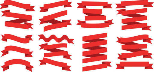 A collection of red ribbons arranged vertically in a repetitive pattern on a plain surface viewed from directly above