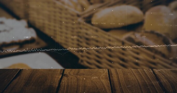 Showing wooden tabletop featuring grain seams at bakery counter, with bread basket and data overlay