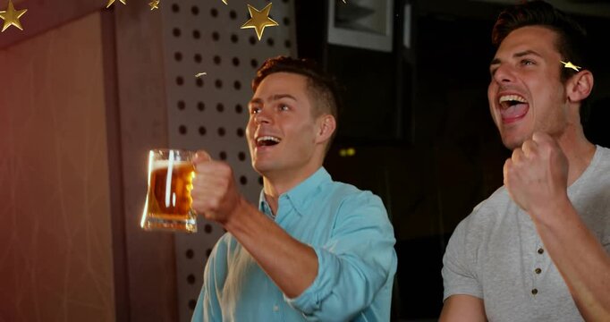Two men watching screen sports win sparking cheering raising beer mugs gold stars floating by faces