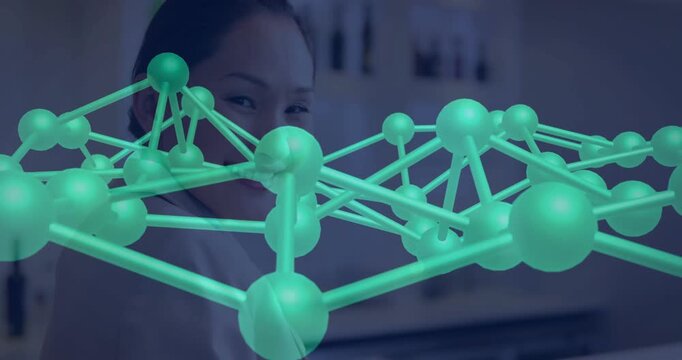 Woman turning head while teal 3D molecule network drifting, hiding then revealing face for science