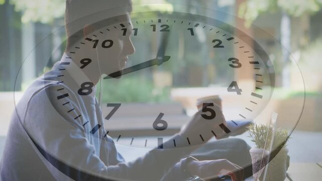 Man sipping cup, adjusting cup, typing on laptop, clock overlay tracking time for remote work