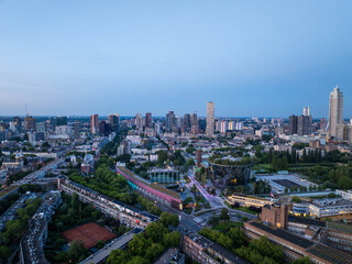 Fototapeta premium Captivating aerial view of rotterdam's cityscape featuring Museumpark and Depot Boijmans Van Beuningen, showcasing modern architecture during the blue hour