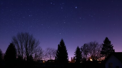 Fototapeta premium Serene Night Sky with Gradient Hue and Stars Over Calm Landscape at Dusk