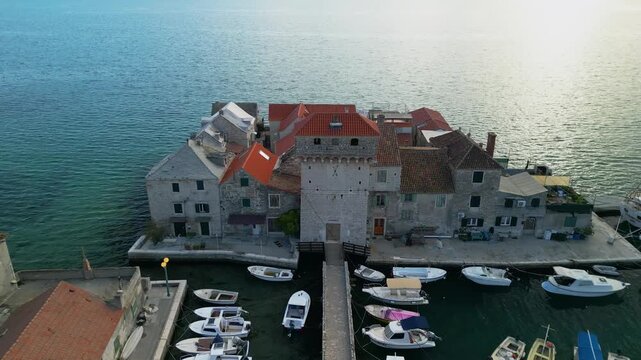 Ka&scaron;tilac Castle on the water Ka&scaron;tel Gomilica in Croatia, Split - 4K aerial drone view - tourist location filmed in Game of Thrones