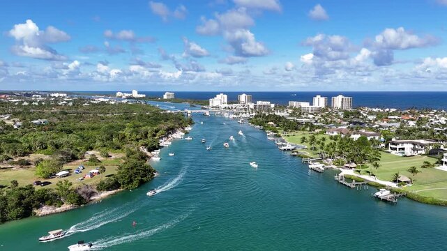 Boats traveling in the intracoastal near Jupiter Inlet in Palm Beach County, Florida. 