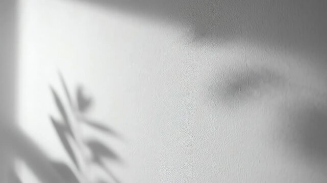 Blurry close-up of a face with a leaf shadow, showcasing emotions and nature's impact on human expression.
