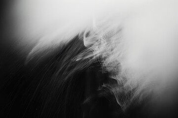 Obraz premium Ghostly motion of smoke against a dark void. Could be used for artistic backgrounds