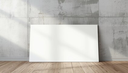 Obraz premium Blank white canvas frame leaning at concrete wall and wood floor 