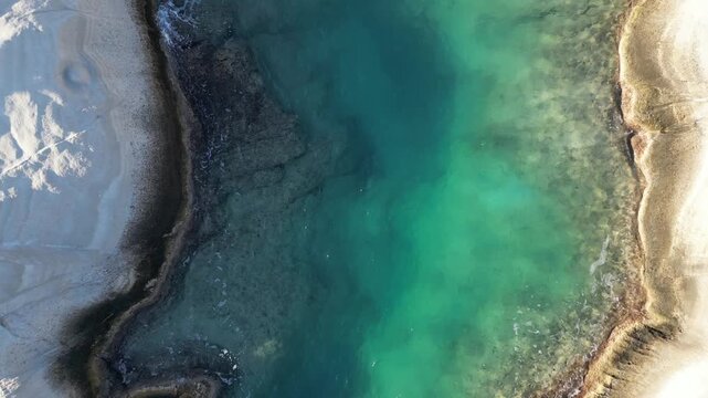Top Down View Of Sarakiniko Beach On Milos Island, Greece - Drone Shot
