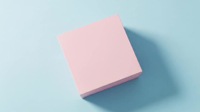 Pink Sticky Notes Stacked on a Light Blue Background Minimalist Office Supplies.