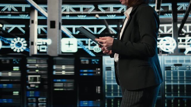 Technician walking in data center, using AR simulation to conduct security audit on IT infrastructure. Server room expert using VFX compositing visualization to verify firewall protection, camera A