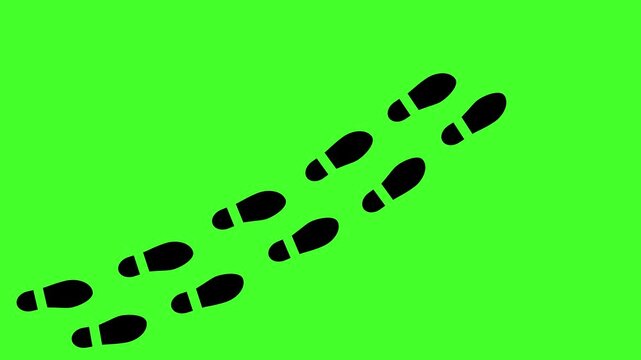 Abstract human shoes footstep walking animation. Black color footprints shoes, shoe prints marks feet animated on green background. 4k video