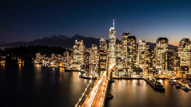 Vancouver BC aerial night hyperlapse of Lions Gate Bridge and Burrard Inlet