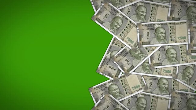 A frame of 500 Indian Rupee notes sliding across the right side of the screen, leaving a green screen workspace on the left. Ideal for text overlays and titles.