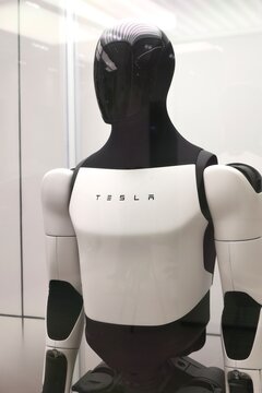 Tesla's AI robot, named Optimus, is a humanoid robot under development by Tesla, Inc