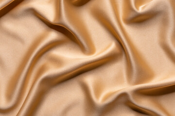 Obraz premium Luxury smooth satin fabric texture featuring gentle light reflections and elegant folds