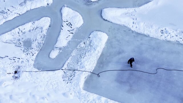 Outdoor public park in Winter time after deep snow fall from freezing cold front in central New York State village of Fairport