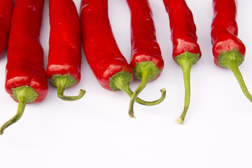 Red chili pepper on white background.