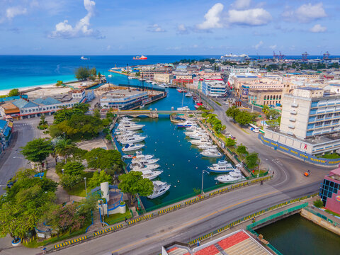 Yachts moored at Careenage (Constitution River) in historic city center of Bridgetown, Barbados. Historic Bridgetown and its Garrison is a UNESCO World Heritage Site.