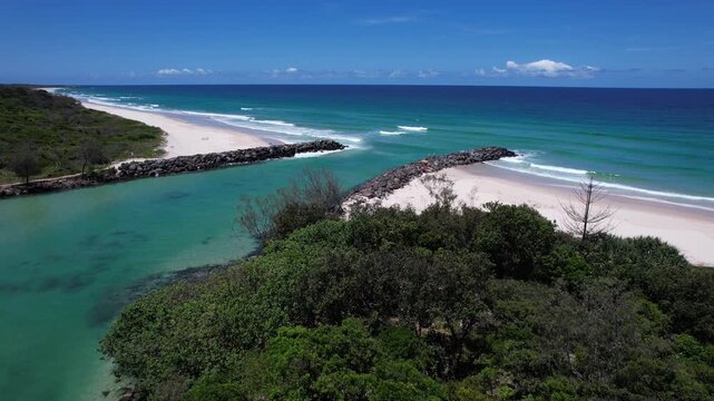 Mouth Of Mooball Creek Meets The Ocean At Pottsville In New South Wales, Australia. Aerial Sideways Shot