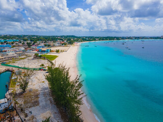 Fototapeta premium Brownes Beach aerial view at Carlisle Bay in city of Bridgetown, Saint Michael, Barbados. This coast belongs to Bridgetown and Garrison UNESCO World Heritage Site. 