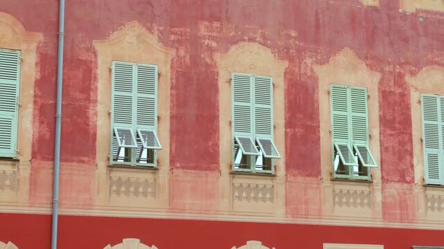 Wooden shutter window of Historic Henri Matisse Museum building in Nice, France