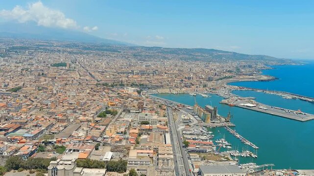 Catania, Sicily, Italy. The territory of the industrial zone and the port of Catania. Drone footage