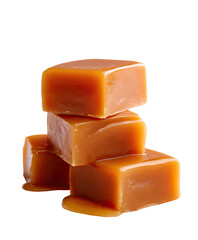 Stack of four amber, glossy caramel candies against a plain black backdrop