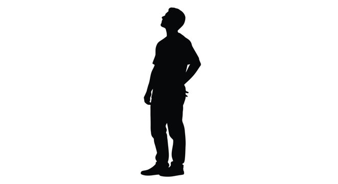 Silhouette of a young man looking upwards with his hand placed casually behind his back