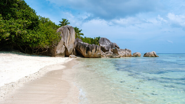 Discover the beauty of Anse Source d'Argent beach in La Digue, Seychelles during sunrise